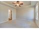 Spacious bedroom featuring large window and ensuite bathroom with glass shower at 288 Abbotts Crossing Cir, Conyers, GA 30094