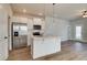 Modern kitchen featuring stainless steel appliances, a kitchen island, and a stylish design at 288 Abbotts Crossing Cir, Conyers, GA 30094