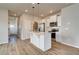 Bright kitchen featuring stainless steel appliances, a central island, and modern finishes at 288 Abbotts Crossing Cir, Conyers, GA 30094