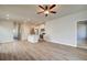 Open-concept area featuring a kitchen island, wood floors, and recessed lighting at 288 Abbotts Crossing Cir, Conyers, GA 30094