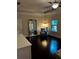 Bedroom with dark hardwood flooring, a ceiling fan, and natural light at 4858 Stratford Ln, Johns Creek, GA 30022