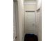 Hallway featuring hardwood floors and white doors at 4858 Stratford Ln, Johns Creek, GA 30022