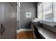 Office area features a large desk, printer, and lots of natural light from the window at 958 Austin Ne Ave, Atlanta, GA 30307