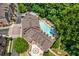 An aerial view of the community, showcasing the swimming pool, clubhouse, and green spaces at 200 River Vista Dr # 540, Atlanta, GA 30339