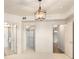 Bedroom with direct access to the Primary bathroom and walk-in closet with custom shelving at 200 River Vista Dr # 540, Atlanta, GA 30339