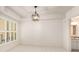 Well-lit bedroom features carpeted floors and large window with shutters for ample light at 200 River Vista Dr # 540, Atlanta, GA 30339