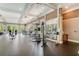 A full work out facility with a variety of exercise equipment overlooking a landscape, perfect for a fitness lifestyle at 200 River Vista Dr # 540, Atlanta, GA 30339