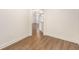 Hardwood flooring leads from the hallway into the kitchen with a breakfast bar at 200 River Vista Dr # 540, Atlanta, GA 30339