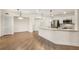 An open kitchen with stainless appliances, granite counters, and hardwood floors is great for entertaining at 200 River Vista Dr # 540, Atlanta, GA 30339