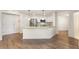 Well-lit kitchen features stainless steel appliances and a granite-topped breakfast bar at 200 River Vista Dr # 540, Atlanta, GA 30339