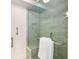 Modern shower with glass enclosure and a built-in bench for a spa-like experience at 200 River Vista Dr # 540, Atlanta, GA 30339