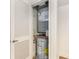 Utility closet containing a modern water heater and HVAC unit at 200 River Vista Dr # 540, Atlanta, GA 30339