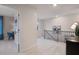 Open hallway filled with natural light and neutral colors at 290 Abbotts Crossing Cir, Conyers, GA 30094