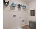 Functional laundry room with storage shelving and ample space at 290 Abbotts Crossing Cir, Conyers, GA 30094