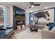 Inviting living room with a modern fireplace, comfortable seating, and stylish decor at 290 Abbotts Crossing Cir, Conyers, GA 30094