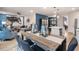 Spacious open concept living and dining areas with modern decor and ample natural light at 290 Abbotts Crossing Cir, Conyers, GA 30094