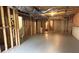Unfinished basement with concrete floor, exposed ceiling, and wooden frame walls at 5029 Preservation Pointe, Kennesaw, GA 30152