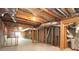 Unfinished basement with concrete floor, wooden frame walls, and exposed ceiling at 5029 Preservation Pointe, Kennesaw, GA 30152