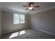 Bedroom featuring a neutral color palette and one window at 5029 Preservation Pointe, Kennesaw, GA 30152