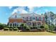 Beautiful brick home with manicured landscaping and a welcoming front porch, perfect for suburban living at 5029 Preservation Pointe, Kennesaw, GA 30152