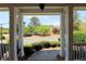 Inviting front porch with classic columns and well-maintained landscaping creates an excellent first impression at 5029 Preservation Pointe, Kennesaw, GA 30152