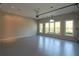 Spacious garage featuring ample lighting and large windows, perfect for multiple vehicles and projects at 5029 Preservation Pointe, Kennesaw, GA 30152