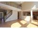 Spacious living room with a loft area, hardwood floors, and an open layout at 5029 Preservation Pointe, Kennesaw, GA 30152