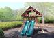 Outdoor wooden playset features two slides and climbing area, perfect for Gathering fun at 5029 Preservation Pointe, Kennesaw, GA 30152