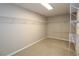 A walk-in closet featuring wire shelving, providing ample storage solutions and organization options at 5029 Preservation Pointe, Kennesaw, GA 30152