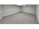 Spacious basement offers a large open area and neutral carpeting at 64 Little John Way, Douglasville, GA 30134
