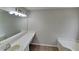 Bathroom featuring a long vanity with ample counter space and a built-in seat at 64 Little John Way, Douglasville, GA 30134