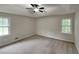 Bedroom with plush carpeting, neutral walls, and natural lighting at 64 Little John Way, Douglasville, GA 30134
