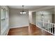 Dining room featuring hardwood floors and decorative lighting at 64 Little John Way, Douglasville, GA 30134