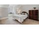 Cozy bedroom with sloped ceilings, a built-in window seat, and classic furnishings at 77 Peachtree Ne Pl # 608, Atlanta, GA 30309