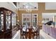 Dining area with hardwood floors, chandelier and plenty of natural light at 77 Peachtree Ne Pl # 608, Atlanta, GA 30309