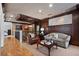 Inviting living room with hardwood floors, dark wood trim, and stylish furnishings offer a cozy retreat at 77 Peachtree Ne Pl # 608, Atlanta, GA 30309