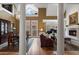 Elegant living room featuring a fireplace, soaring ceilings, and beautiful hardwood floors at 77 Peachtree Ne Pl # 608, Atlanta, GA 30309
