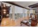 Spacious loft area with hardwood floors and wood accents; perfect space for relaxing or entertaining at 77 Peachtree Ne Pl # 608, Atlanta, GA 30309