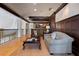 Inviting loft area with hardwood floors, dark wood accents, and comfortable seating arrangement at 77 Peachtree Ne Pl # 608, Atlanta, GA 30309