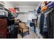 Functional walk-in closet offering ample storage space with shelving and clothing racks at 77 Peachtree Ne Pl # 608, Atlanta, GA 30309