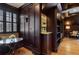 Inviting window seat with dark wood trim and built-in wet bar cabinets offers unique charm and sophistication at 77 Peachtree Ne Pl # 608, Atlanta, GA 30309