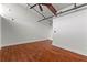 Bedroom with hardwood floors, exposed pipes and ceiling fan at 1261 Caroline Street Ne # 206, Atlanta, GA 30307