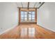 Open floor plan with windows that provide natural light, and wooden floors at 1261 Caroline Street Ne # 206, Atlanta, GA 30307