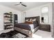 Well-lit bedroom featuring stylish decor, modern ceiling fan, and sleek furniture creating an inviting atmosphere at 1371 Walking Way, Atlanta, GA 30316