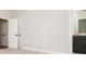 Bright bedroom showcasing double door closet and bathroom vanity with dark cabinetry at 1371 Walking Way, Atlanta, GA 30316