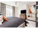 Bright bedroom with large windows, a plush bed, modern decor and stylish curtains, a perfect relaxation space at 1371 Walking Way, Atlanta, GA 30316