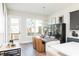 Stylish dining room features ample natural light and a modern light fixture at 1371 Walking Way, Atlanta, GA 30316