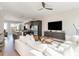 Bright open-concept living space with modern kitchen, living room and large island with barstool seating at 1371 Walking Way, Atlanta, GA 30316
