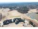 An aerial view of a stately home and surrounding golf course, highlighting the expansive property at 235 Laurel Vista Dr, Canton, GA 30114