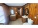 Bathroom with two vanities, toilet, and a window at 2391 Randall Ave, Lithonia, GA 30058